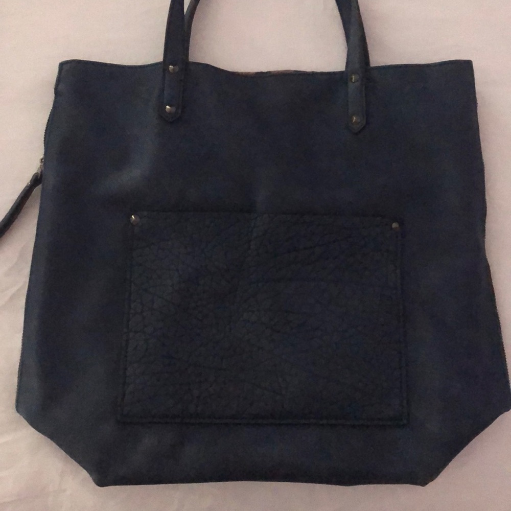 reversable navy and cheetah handbag